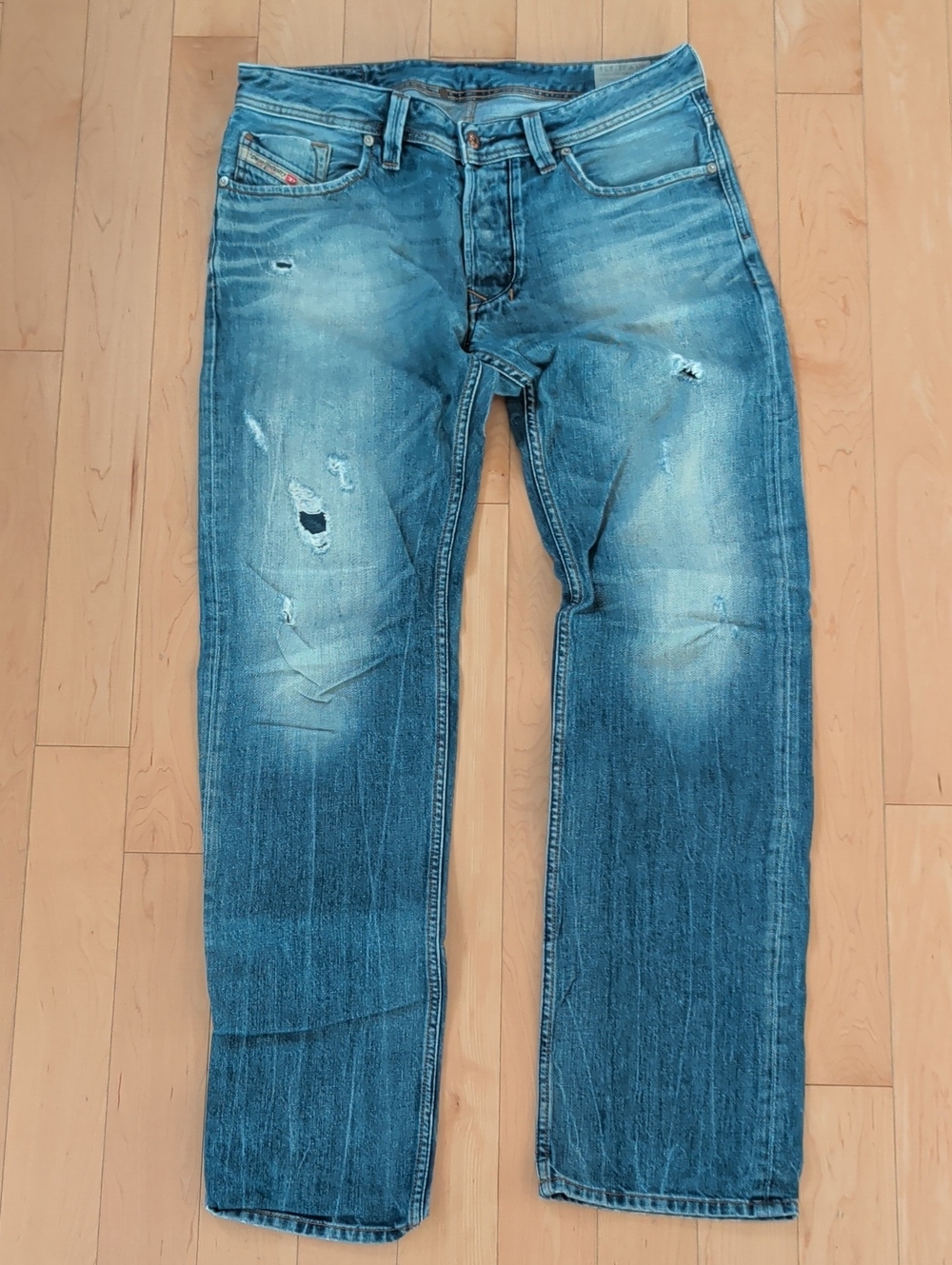 Vintage Diesel Men's Larkee Blue Straight Jeans with Distressed Detail W33L34